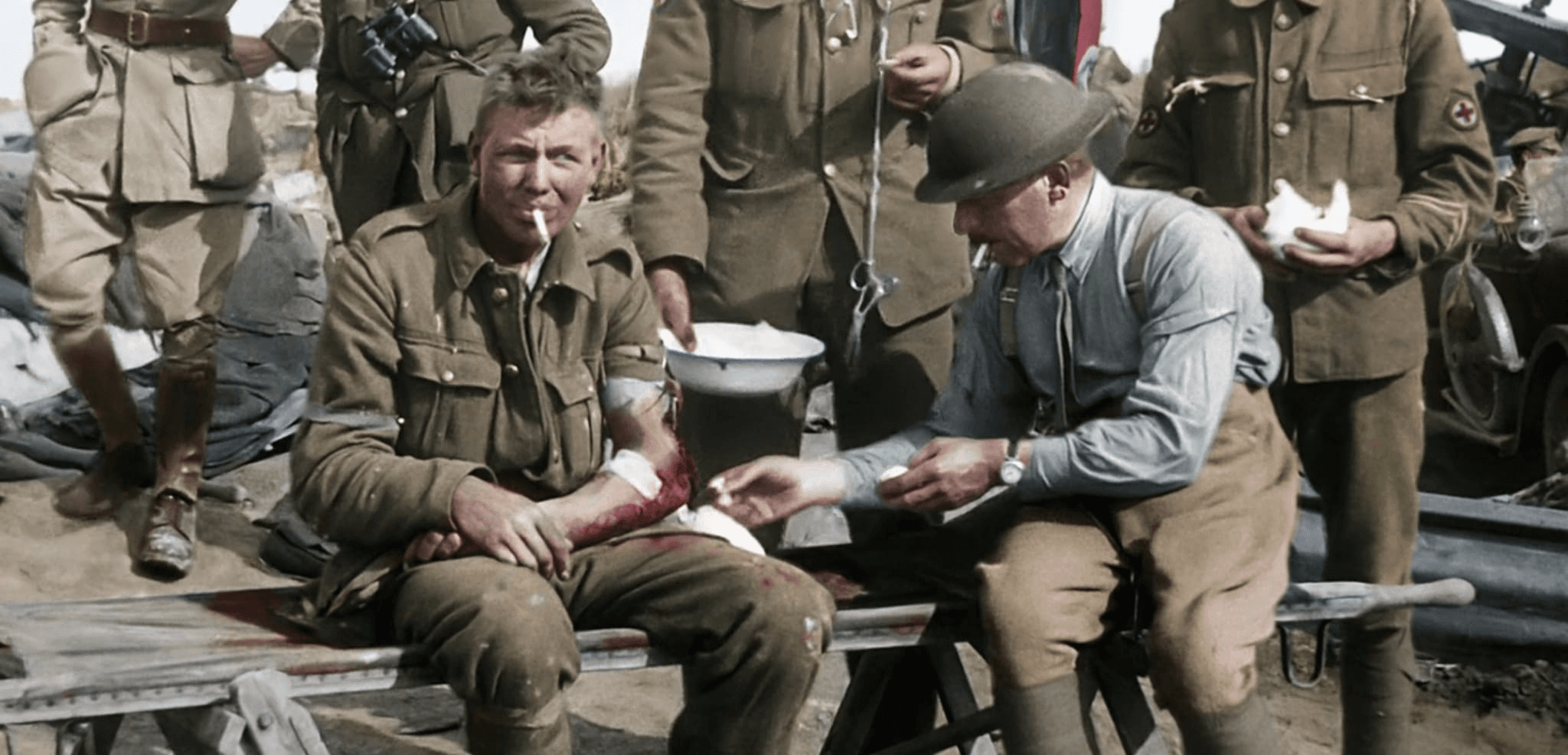 WW1 field dressing scene with a medic wearing a wristwatch
